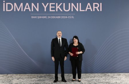 Prezident bu idmançılara ev verdi - Fotolar Prezident bu idmançılara ev verdi - Fotolar